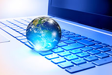Image of a glass globe on a laptop computer